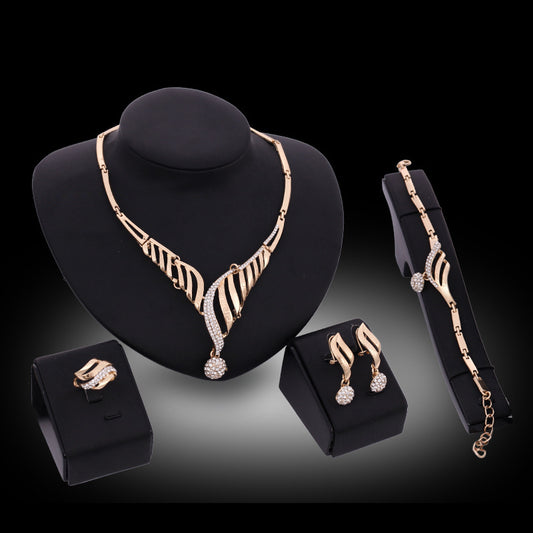 Four-Piece Jewelry Set - Gold POLITICSLADY